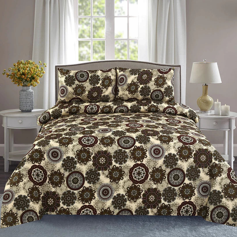 Bedding set with floral pattern on a bed in a room with a window and side tables.
