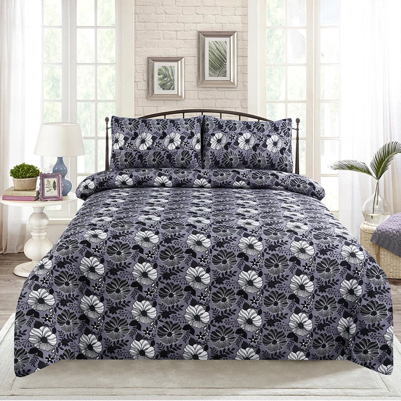 Floral patterned bedding set on a bed in a bedroom setting.