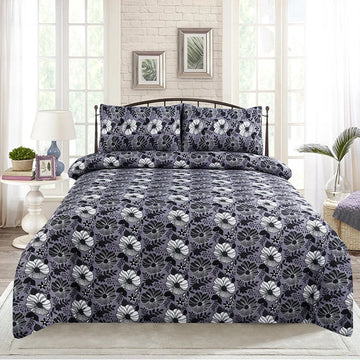 Floral patterned bedding set on a bed in a bedroom setting.