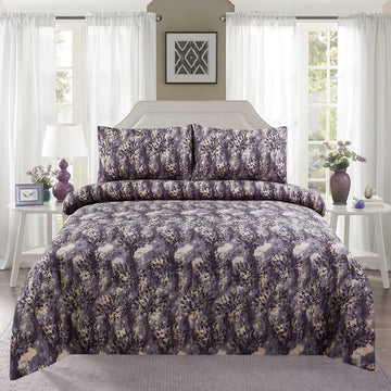 Bedroom with floral-patterned bedding and decorative items.