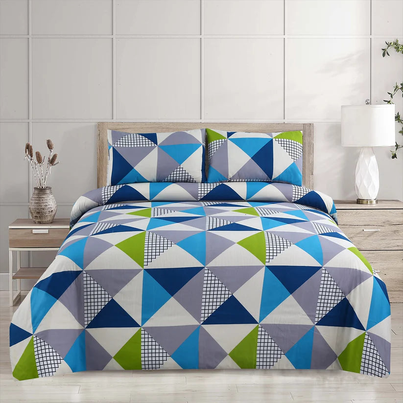 Geometric patterned bedding set on a bed with matching pillows and nightstands.