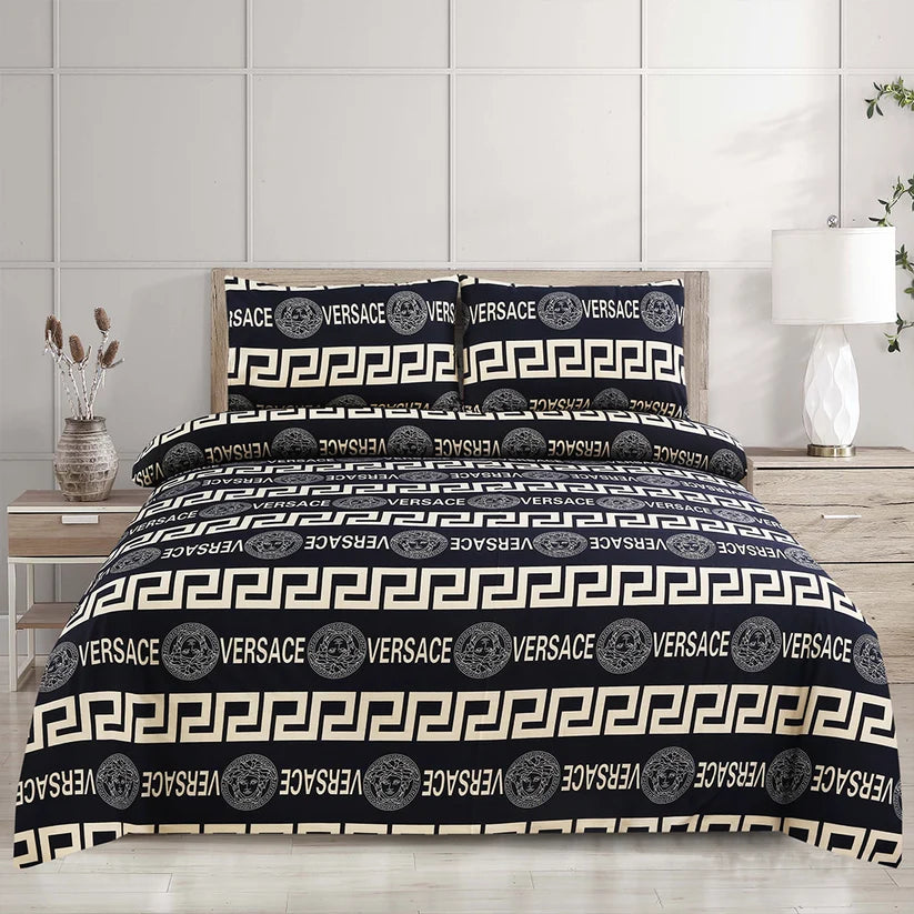 Versace bedspread set on a bed in a bedroom setting