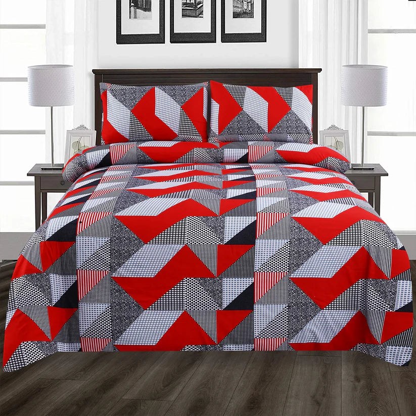 Geometric patterned quilt set on a bed in a bedroom setting