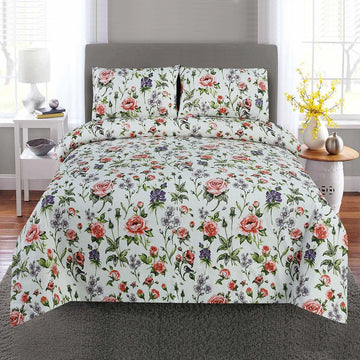 Floral bedding set on a bed in a bedroom setting