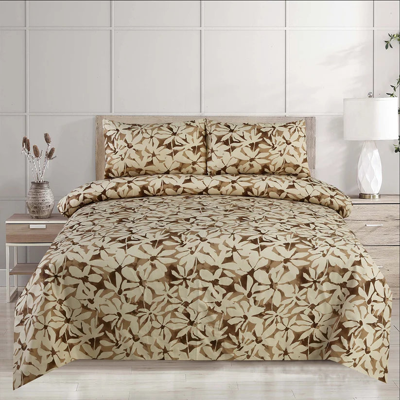 Floral patterned bedding set on a bed with a wooden headboard.