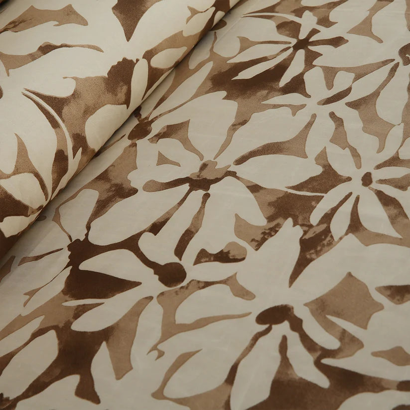 Brown fabric with white floral pattern