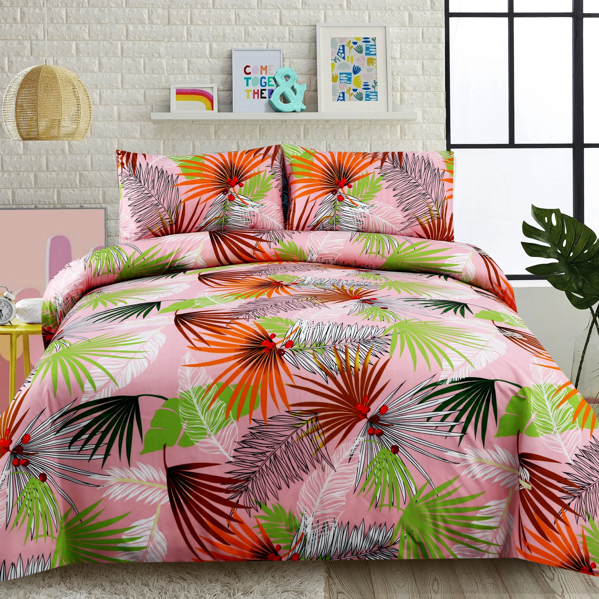 Tropical leaf patterned bedding set on a bed with a colorful headboard and decor.