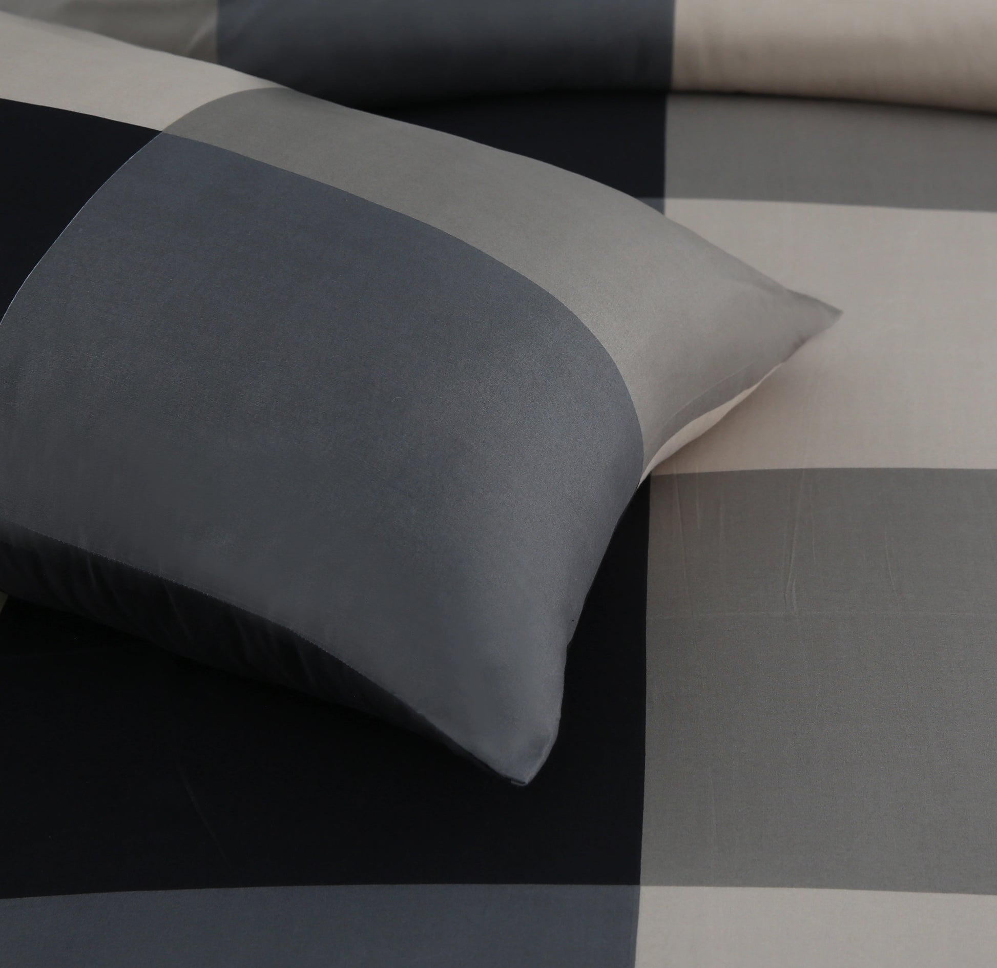 Gray bedding set on a checkered background