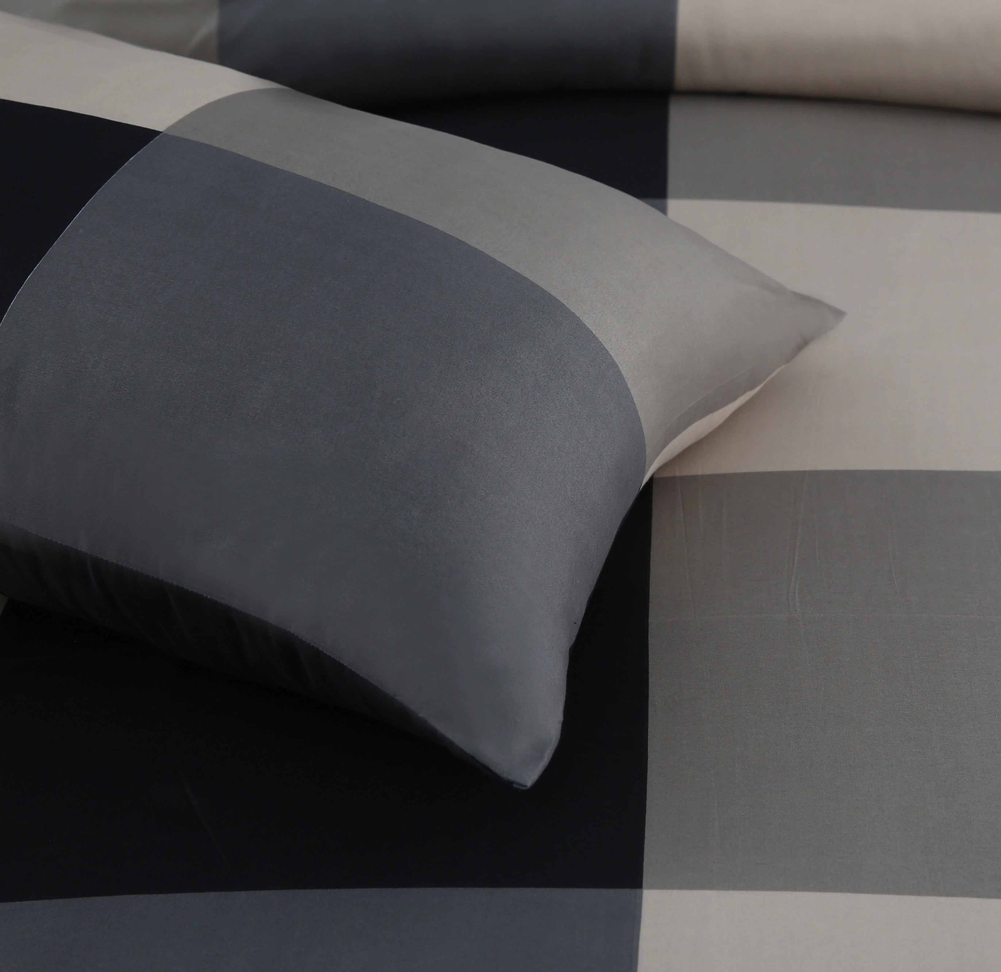 Gray bedding set on a checkered background