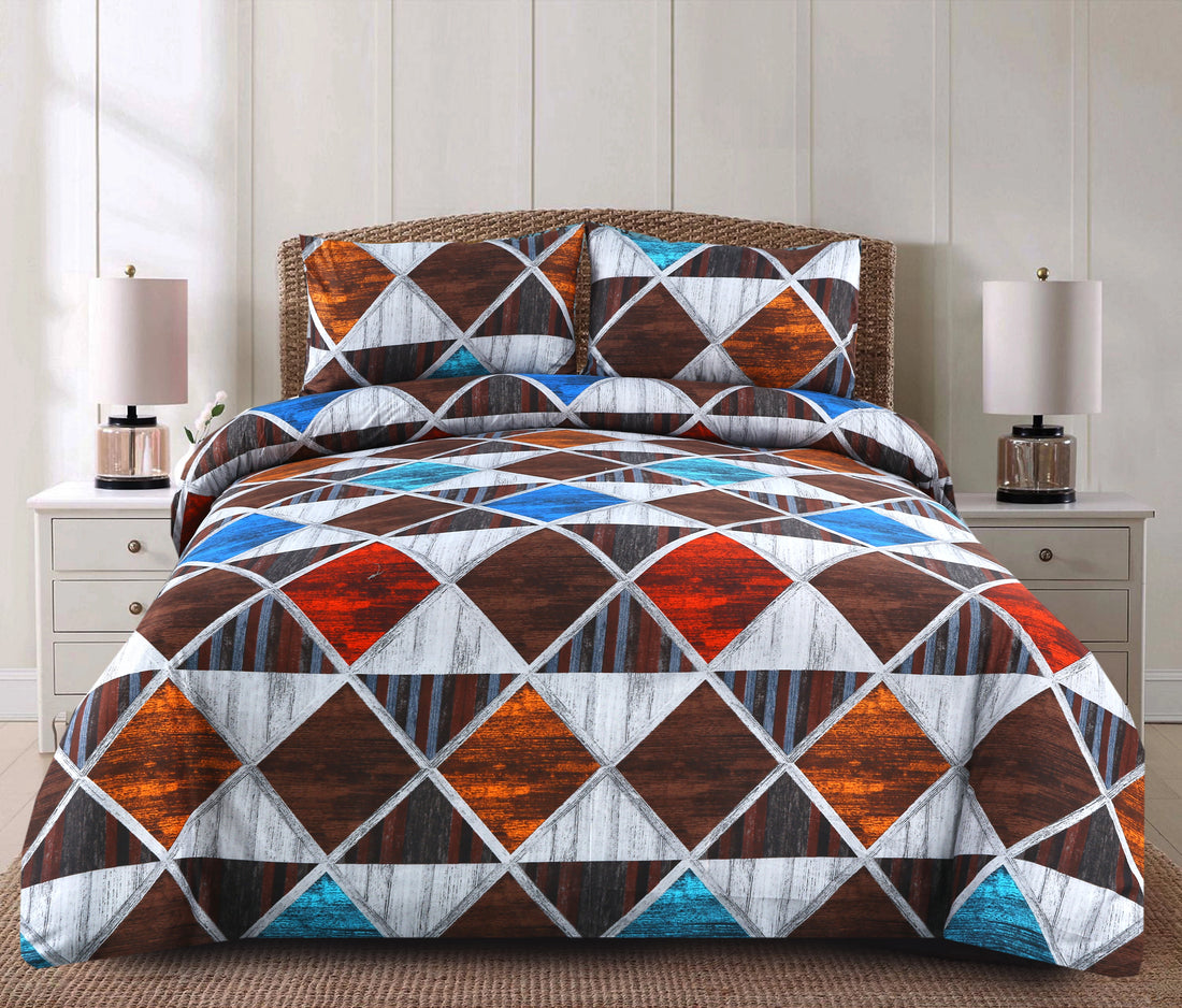Geometric patterned comforter set on a bed with matching pillows in a bedroom setting.