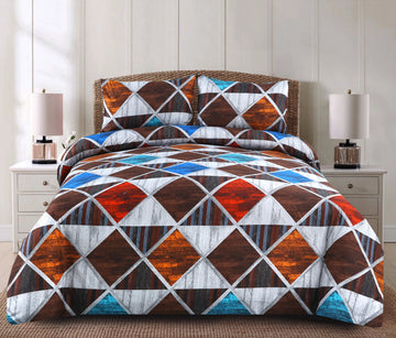 Geometric patterned comforter set on a bed with matching pillows in a bedroom setting.