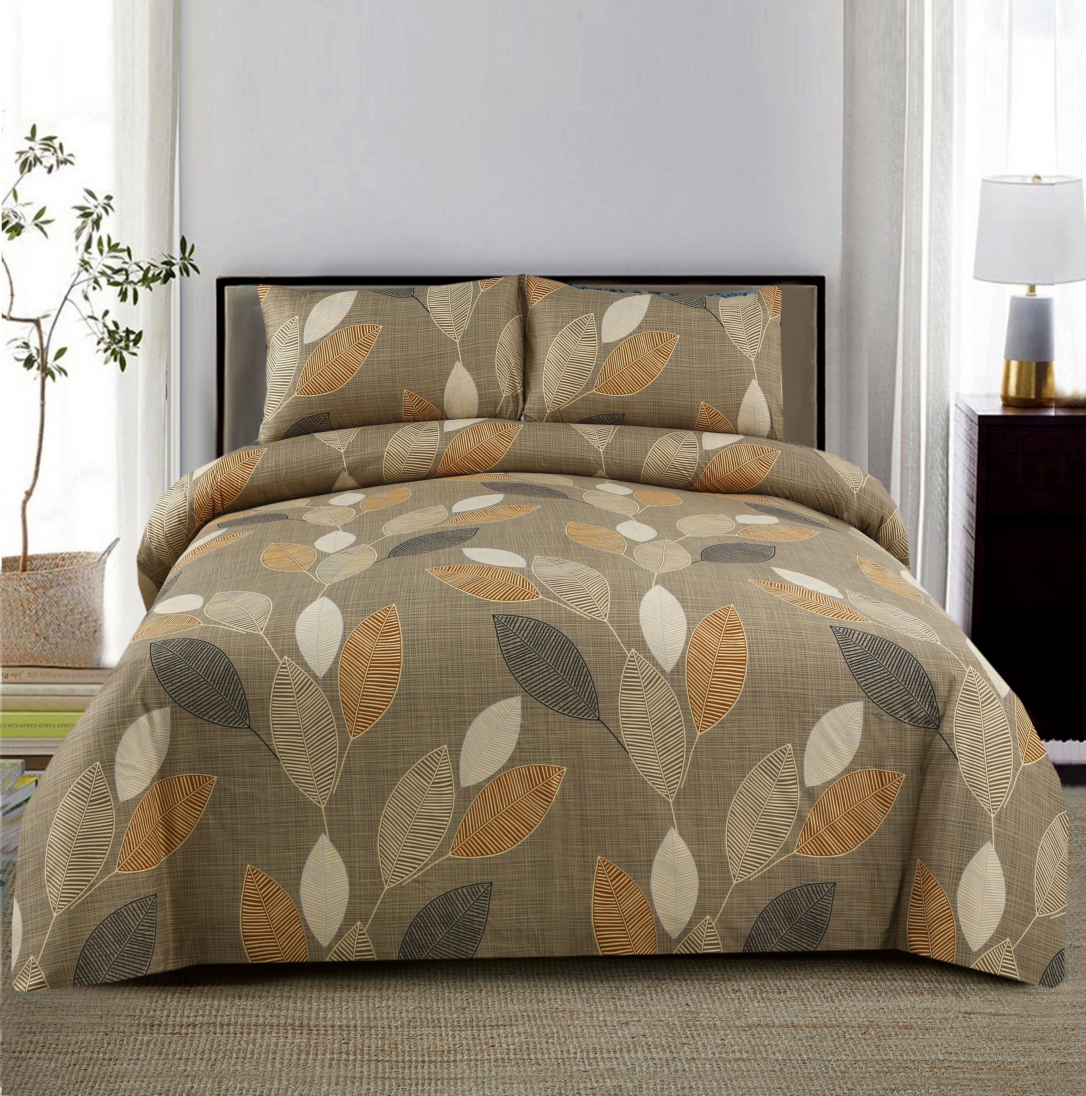 Bedspread with leaf pattern on a bed in a bedroom setting