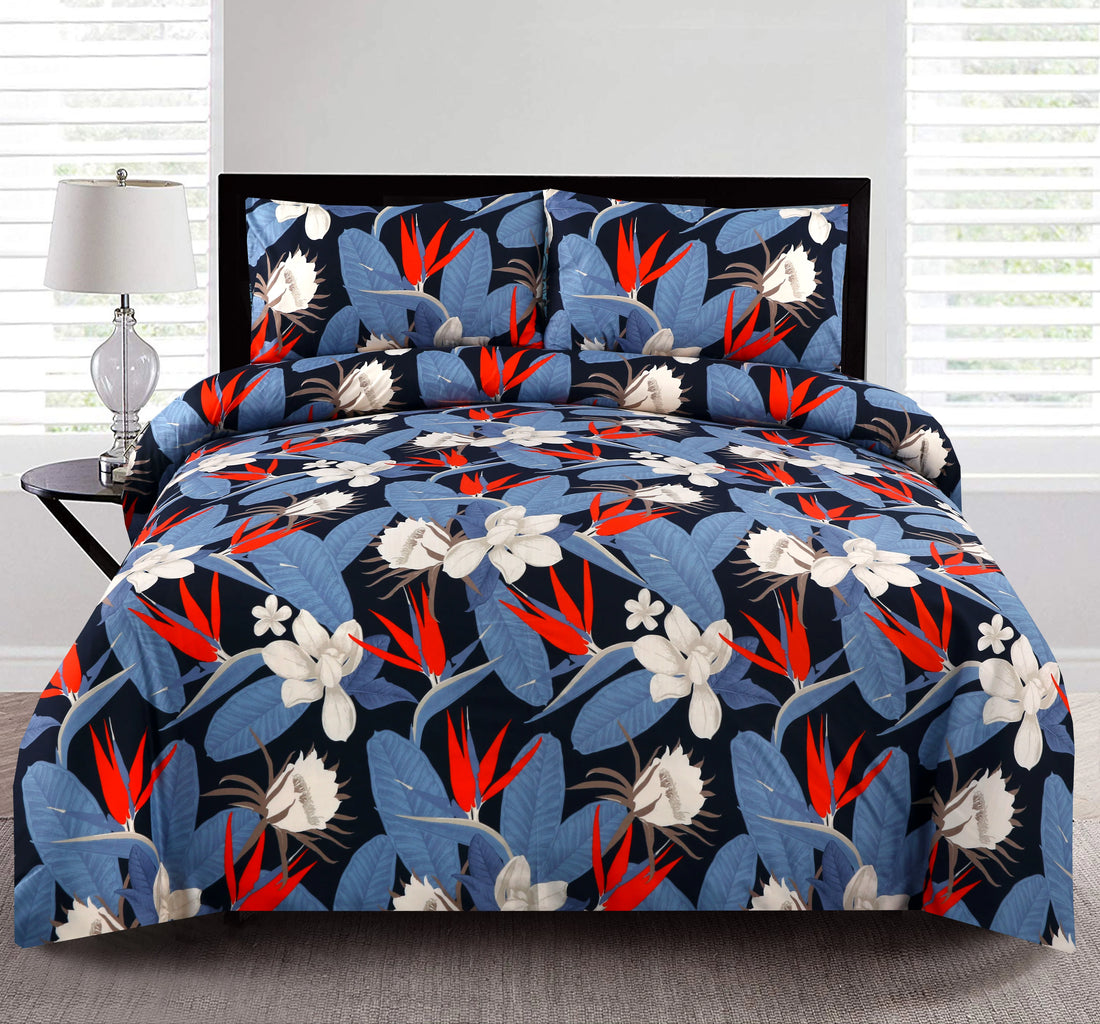 Floral patterned bedding set on a bed with a lamp and window in the background.