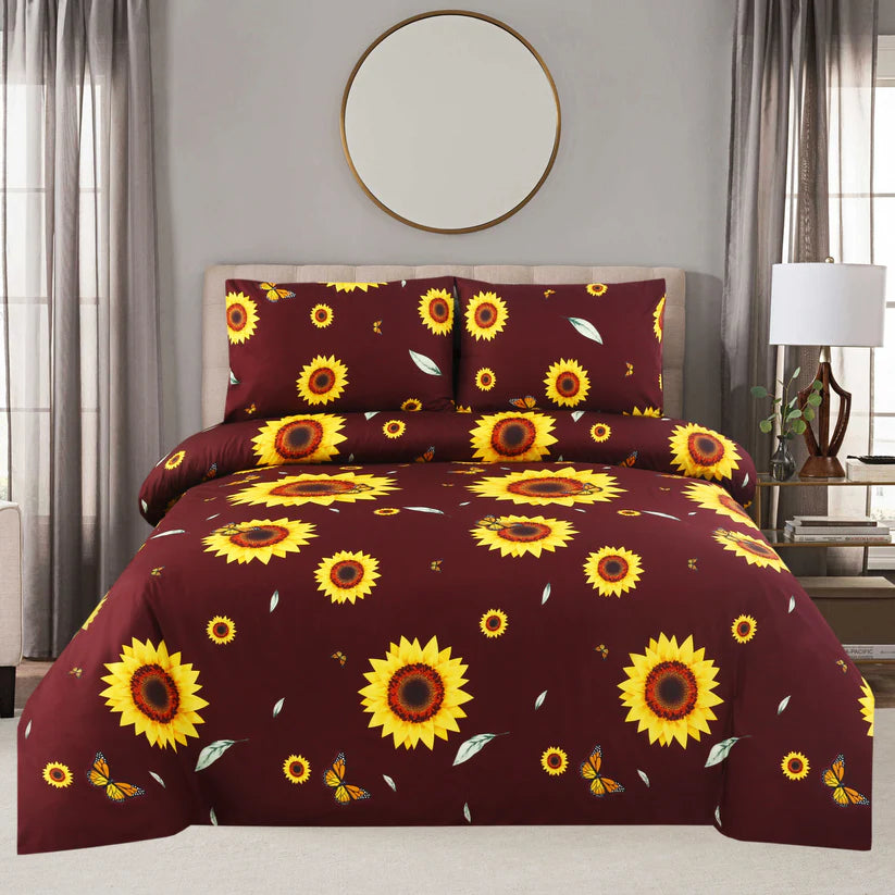 Sunflower patterned bedding set on a bed in a bedroom.