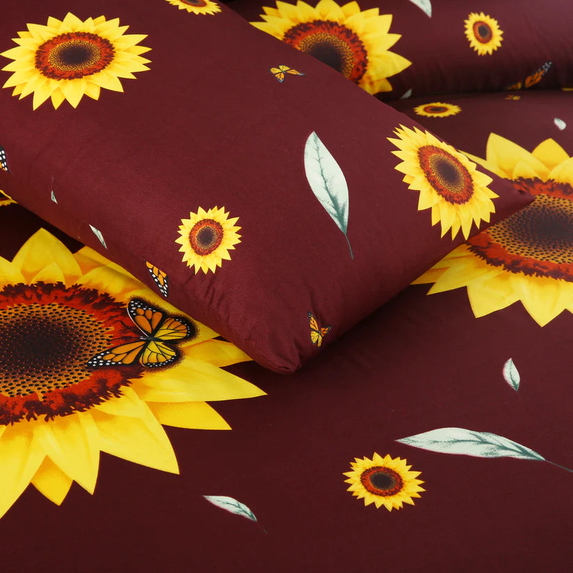 Sunflower patterned fabric with maroon background