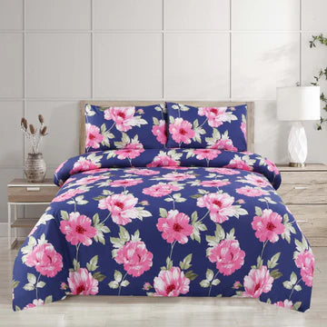 Floral bedding set on a bed with a white wall background