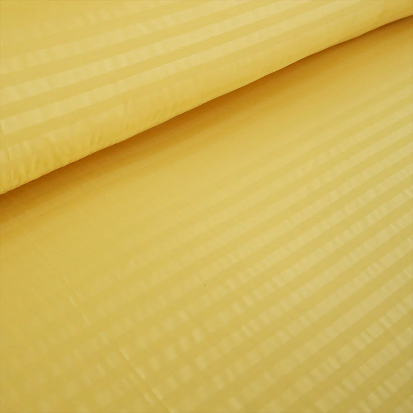 Close-up of yellow textured fabric